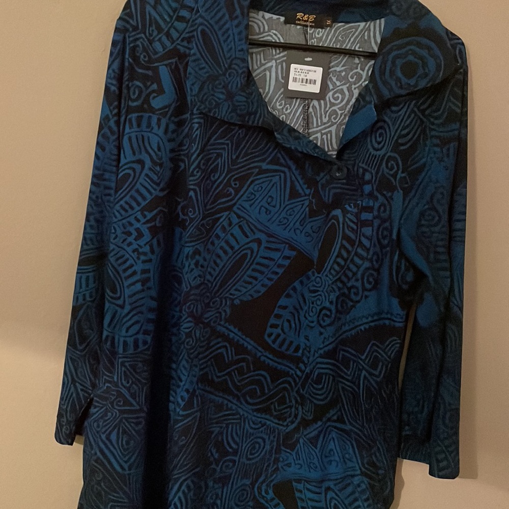 R&B collection ladies dress in size 1X. Color is black & blue.